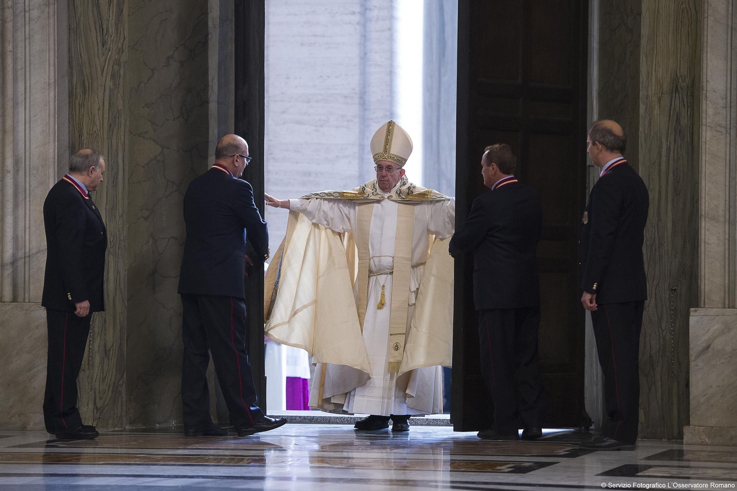 In this 2015 file photo, Pope Francis opens the Holy Door of St. Peter's Basilica to inaugurate the Jubilee Year of Mercy at the Vatican. (CNS photo/L'Osservatore Romano, handout)