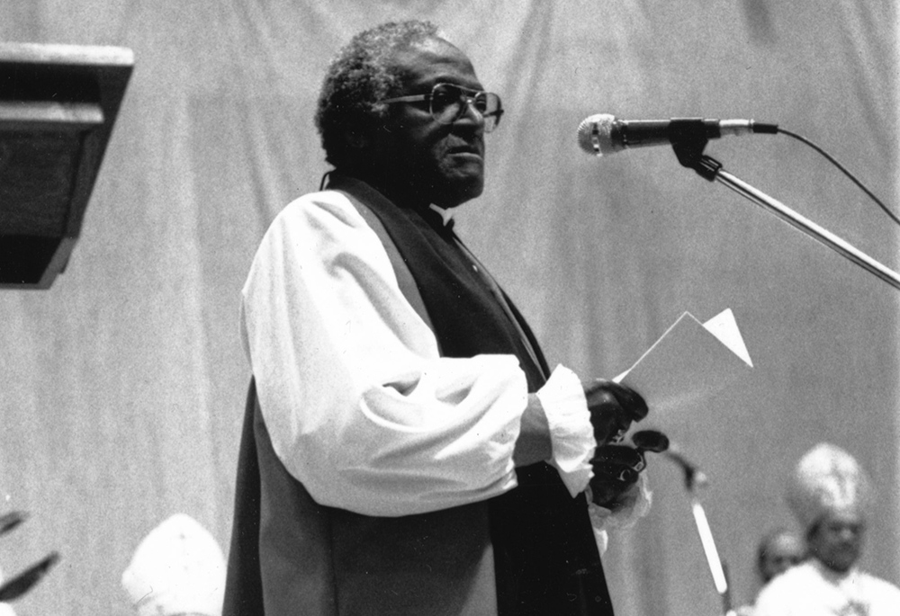 Anglican Archbishop Desmond Tutu is pictured in a 1990 photo. During Marybeth Christie Redmond's first job as a journalist at a local television station, she interviewed Tutu, an experience that stayed with her through 36 years. (CNS/The Southern Cross)