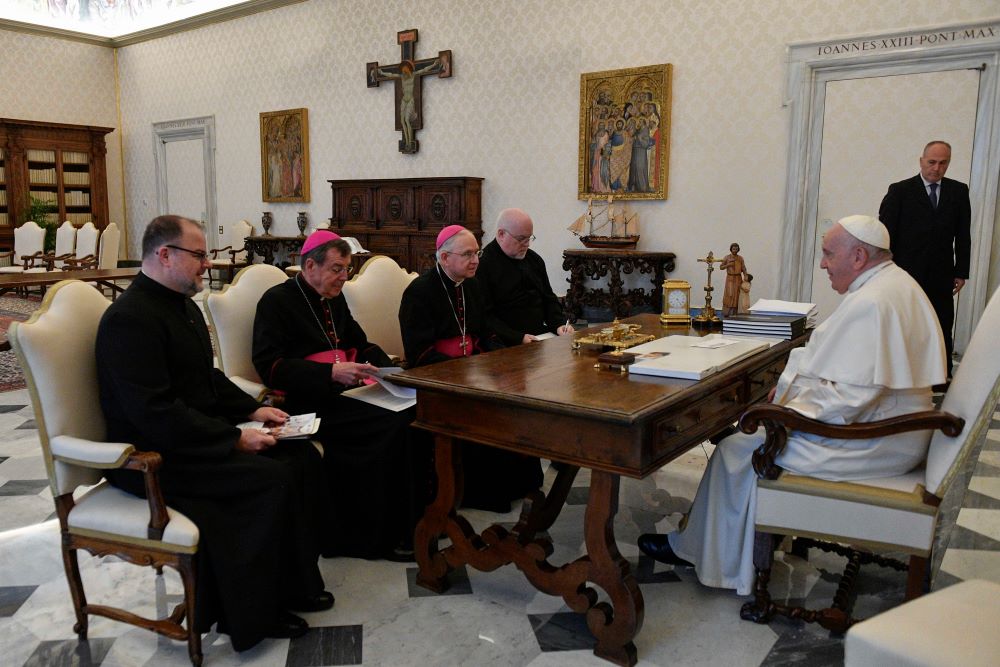 Pope Francis meets with the leadership of the U.S. Conference of Catholic Bishops in the library of the Apostolic Palace at the Vatican Oct. 13. Pictured with the pontiff are Fr. Michael Fuller, general secretary; Detroit Archbishop Allen Vigneron, vice president; Archbishop José Gomez of Los Angeles, president; and Fr. Paul Hartmann, associate general secretary. (CNS/Vatican Media)