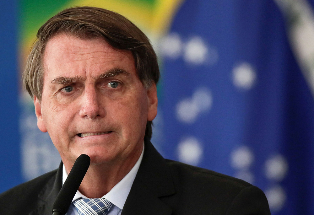 Brazilian President Jair Bolsonaro at a March 2021 ceremony in the capital, Brasilia. (CNS/Reuters/Ueslei Marcelino)