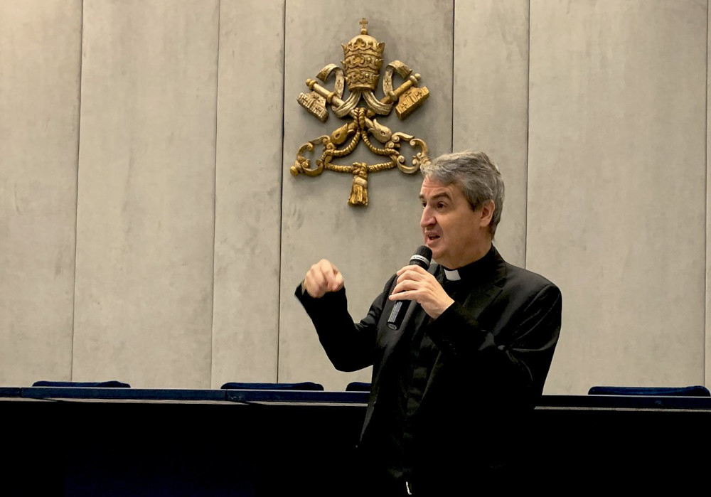 Oblate Father Andrew Small, speaks to reporters in the Vatican press office Oct. 28, 2022
