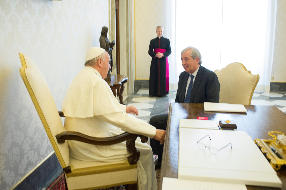 Pope Francis meets Libero Milone, then the Vatican's auditor general, at the Vatican April 1, 2016. 