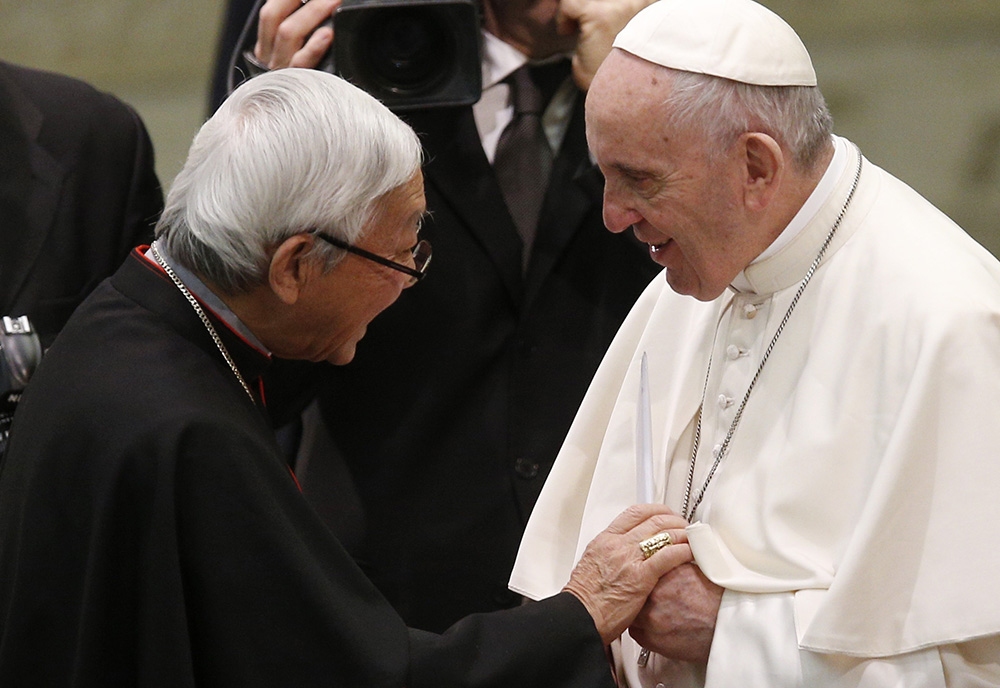 Pope Francis greets Cardinal Joseph Zen, retired archbishop of Hong Kong, during his general audience at the Vatican Jan. 10, 2018. (CNS/Paul Haring)