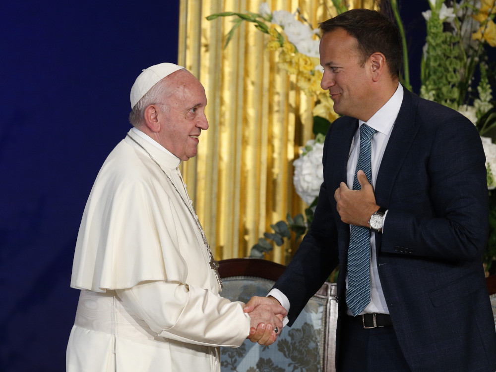 Pope Francis greets Leo Varadkar, then prime minister of Ireland, during a meeting with authorities, civil society leaders and members of the diplomatic corps in Dublin Castle in Dublin Aug. 25, 2018.