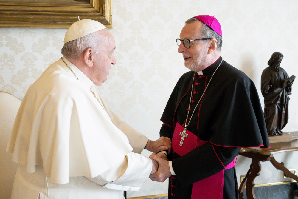Pope Francis meets Archbishop Claudio Gugerotti in the library of the Apostolic Palace Oct. 7, 2022. (CNS photo/Vatican Media)