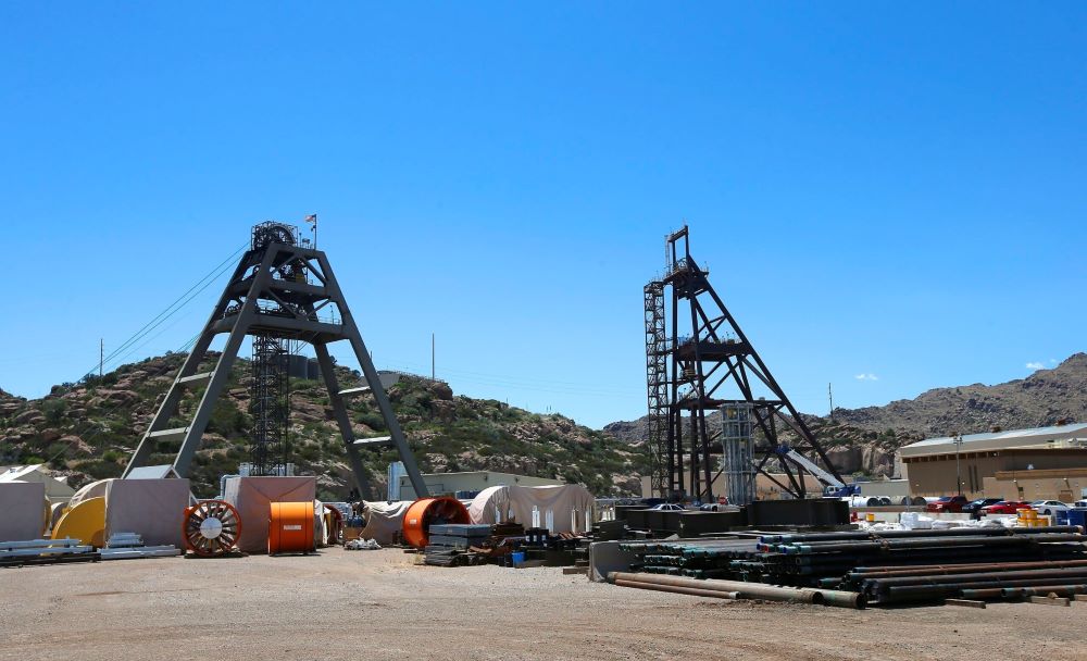This file photo taken June 15, 2015, shows the Resolution Copper Mining area Shaft #9, right, and Shaft #10, left, that await the expansion go-ahead in Superior, Arizona. The mountainous land near Superior is known as Oak Flat or Chi’chil Biłdagoteel. It’s where Apaches have harvested medicinal plants, held coming-of-age ceremonies and gathered acorns for generations. (AP/Ross D. Franklin)
