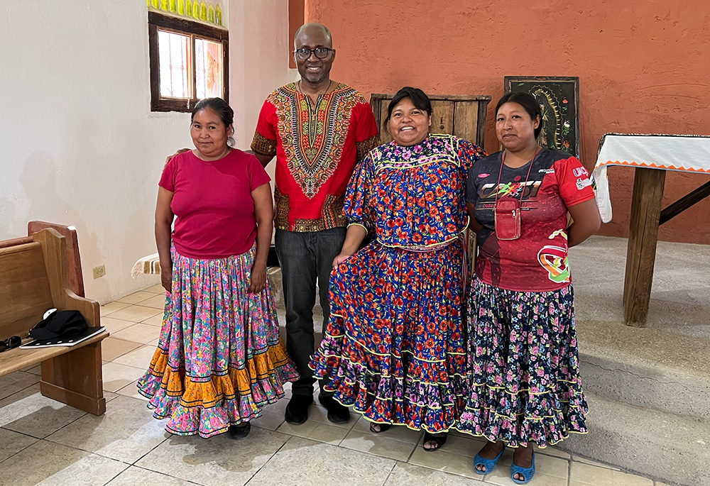 Fr. Stan Chu Ilo poses with members of the Parroquia San Vincente de Paul Catholic parish in Ciudad Juárez. The parish is the home church for the Catholic Ramamurri community; members of eight other Indigenous nations came to the meeting for the Vatican's "Doing Theology from the Existential Peripheries" project. (Courtesy of Stan Chu Ilo)