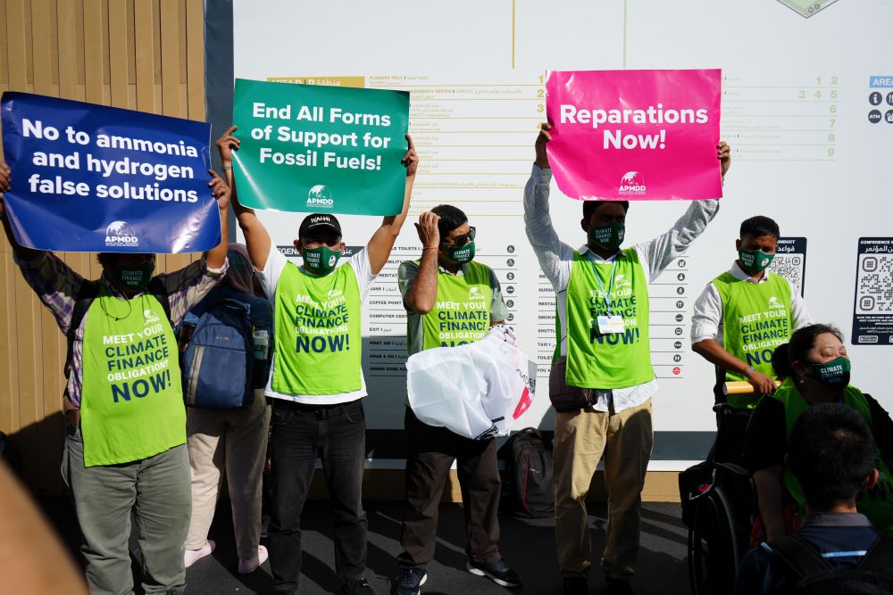 Climate activists from Asian Peoples' Movement on Debt and Development raise concerns in Sharm el-Sheikh, Egypt, Nov. 9, 2022. (Doreen Ajiambo)