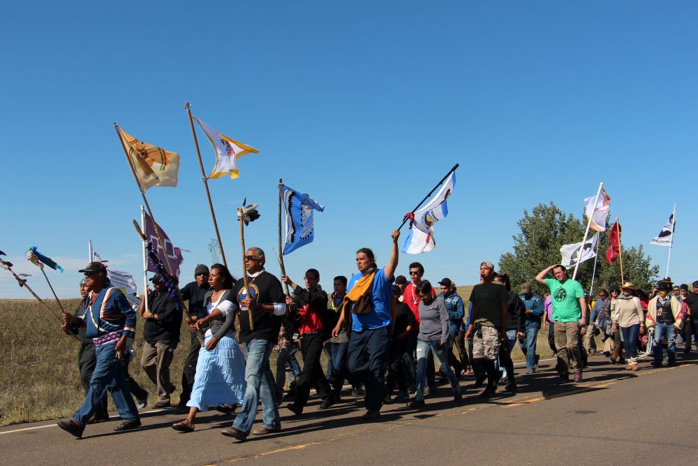 Several hundred people took part in a prayer walk on Sept. 14, 2016, from the Oceti Sakowin camp near Standing Rock Reservation in North Dakota to the site up the road where Dakota Access began digging over Labor Day weekend for construction on a nearly 1,200-mile pipeline project. (RNS/Emily McFarlan Miller)