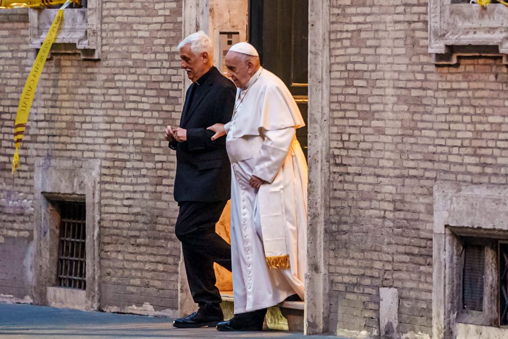 Pope Francis and Jesuit superior leave church