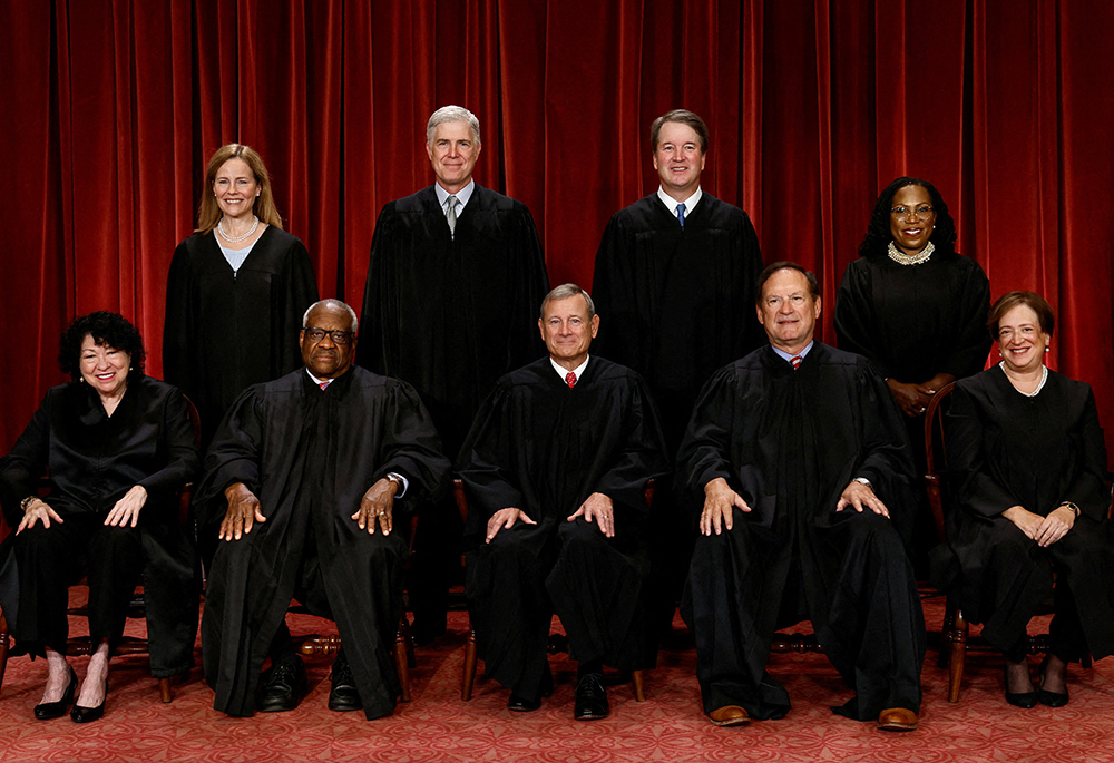 U.S. Supreme Court justices pose for their group portrait at the Supreme Court Oct. 7 in Washington. Seated from left are Justices Sonia Sotomayor and Clarence Thomas, Chief Justice of the United States John Roberts Jr., and Justices Samuel Alito Jr. and Elena Kagan. Standing from left are Justices Amy Coney Barrett, Neil Gorsuch, Brett Kavanaugh and Ketanji Brown Jackson. (CNS/Reuters/Evelyn Hockstein)