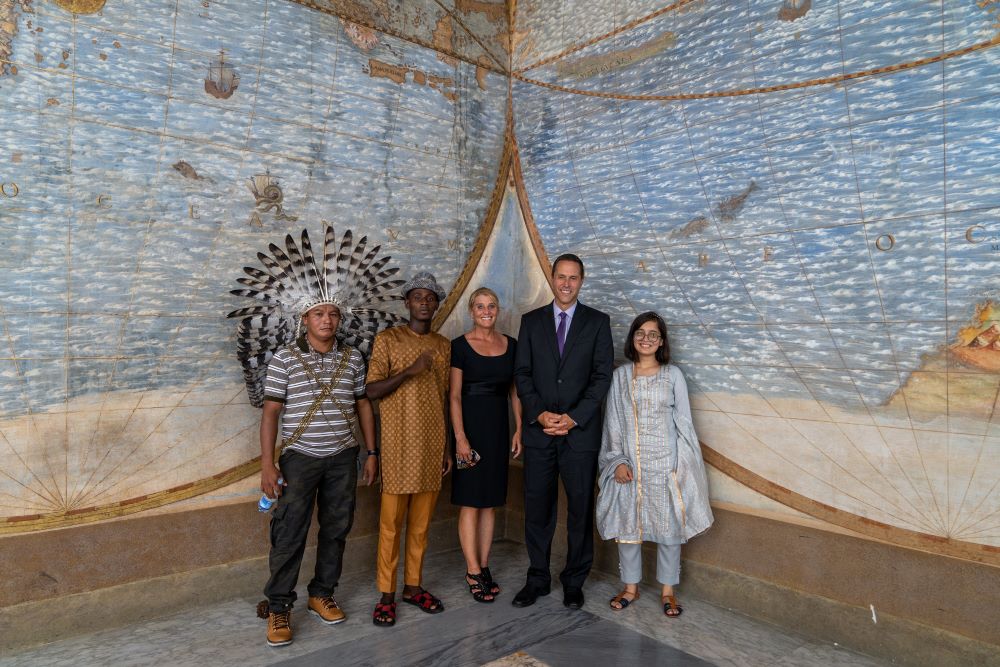 Chief Dadá Borarí from the Maró Indigenous Lands of the Brazilian Amazon; Arouna Kandé, a climate change refugee from Senegal; U.S. scientists Robin Martin and Greg Asner; and teenage climate activist Ridhima Pandey of India participated in the making of the documentary "The Letter." They are seen inside the Apostolic Palace at the Vatican Aug. 26, 2021. (CNS/courtesy Off the Fence)