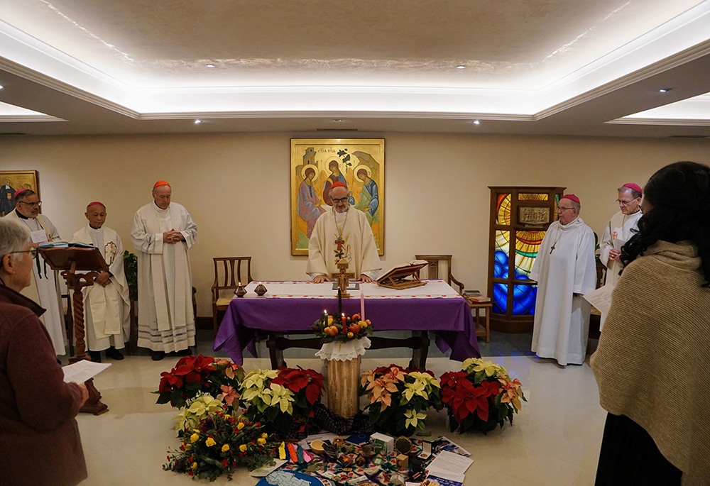 Cardinal Michael Czerny, prefect of the Dicastery for Promoting Integral Human Development, celebrates Mass with participants at an international conference on nonviolence and the teaching of Pope Francis, Dec. 7 in Rome. Among the concelebrants are: at far left, Bishop John Stowe of Lexington, Kentucky; Cardinal Robert McElroy of San Diego, California, to the left of Czerny; and Archbishop John Wester of Santa Fe, New Mexico, far right. (CNS/Courtesy of Pax Christi International/Martin Pilgram)