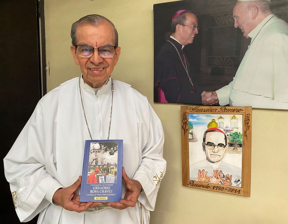Salvadoran Cardinal Gregorio Rosa Chávez holds of copy of a book that addresses part of half a century of his life serving the Catholic Church in El Salvador Dec. 16, 2022, at St. Francis of Assisi parish in San Salvador. (CNS/Rhina Guidos)