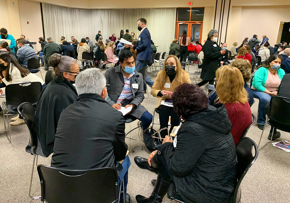 A synod training session is held by Communities Organized for Relational Power in Action (COPA) — part of the West/Southwest Industrial Areas Foundation network — at a parish in the Diocese of Monterey, California, last January. COPA community organizers trained around 500 Catholics to conduct synodal listening sessions in the region. (Courtesy of Tim McManus)