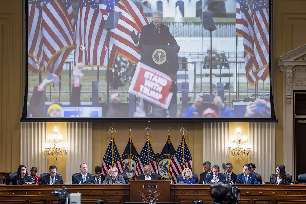 A video of former President Donald Trump is shown on a screen, as the House select committee investigating the Jan. 6 attack on the U.S. Capitol holds its final meeting on Capitol Hill in Washington Dec. 19. (Jim Lo Scalzo, Pool Photo via AP)