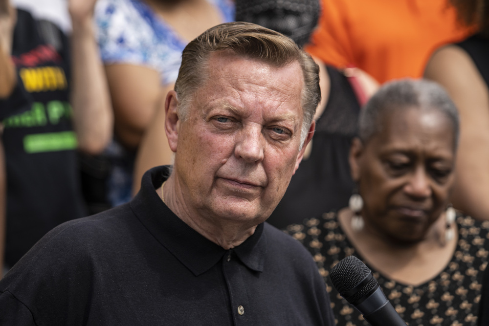 Fr. Michael Pfleger speaks during a news conference outside St. Sabina Church in Chicago, May 24, 2021. (Ashlee Rezin Garcia/Chicago Sun-Times via AP, file)