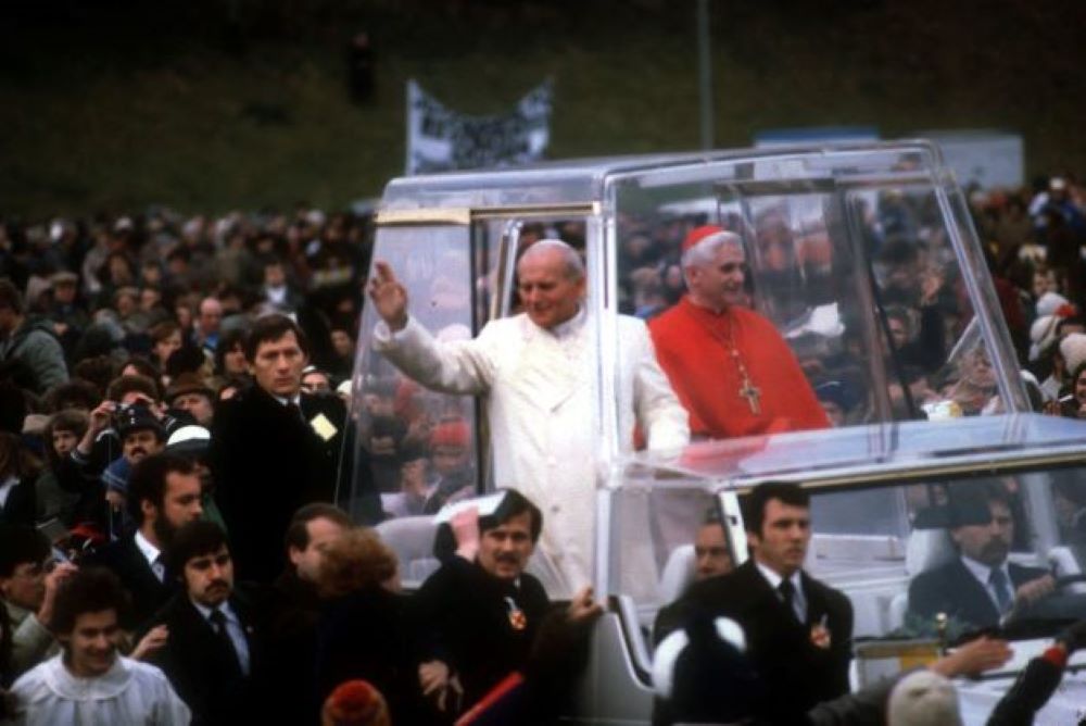 John Paul II and then-Cardinal Ratzinger in the Popemobile in 1980