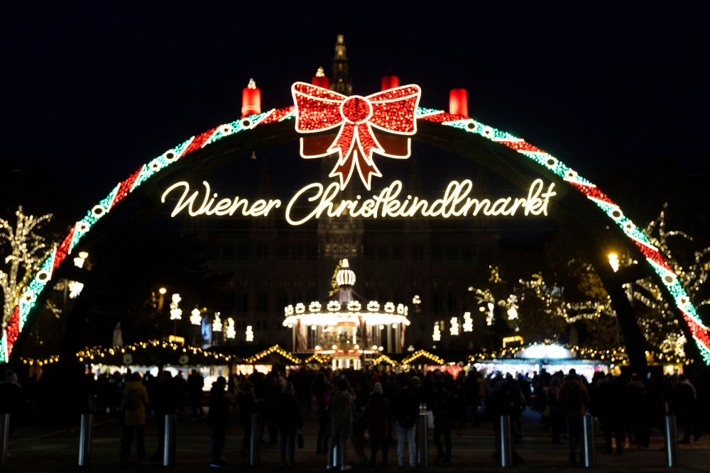 Decorations illuminate the entrance to the Viennese Christmas Market at City Hall Square in Vienna Dec. 6. (CNS/Reuters/Lisa Leutner)