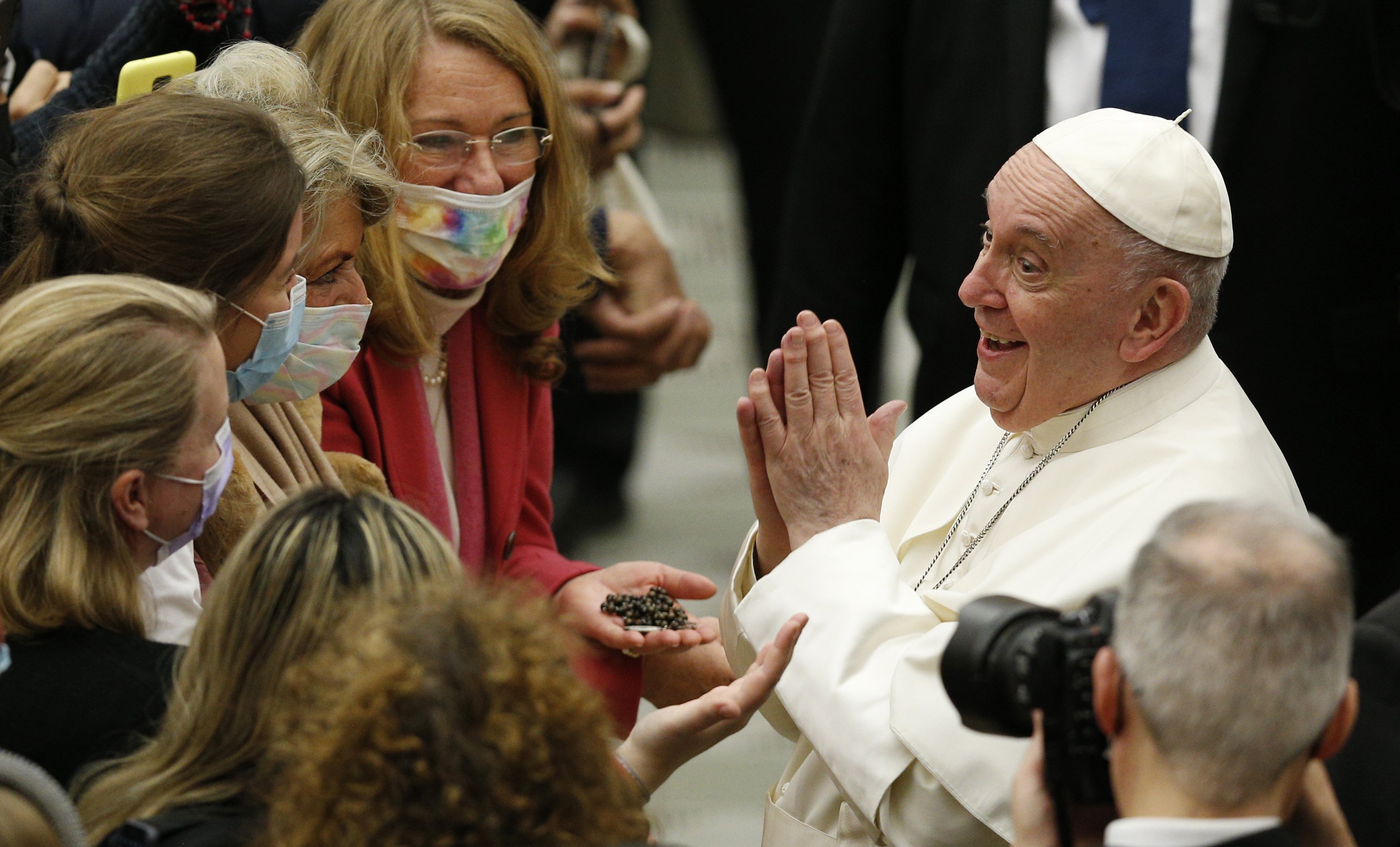Pope Francis gestures as he greets people during his general audience in the Paul VI hall at the Vatican Jan. 5, 2022. (CNS photo/Paul Haring)