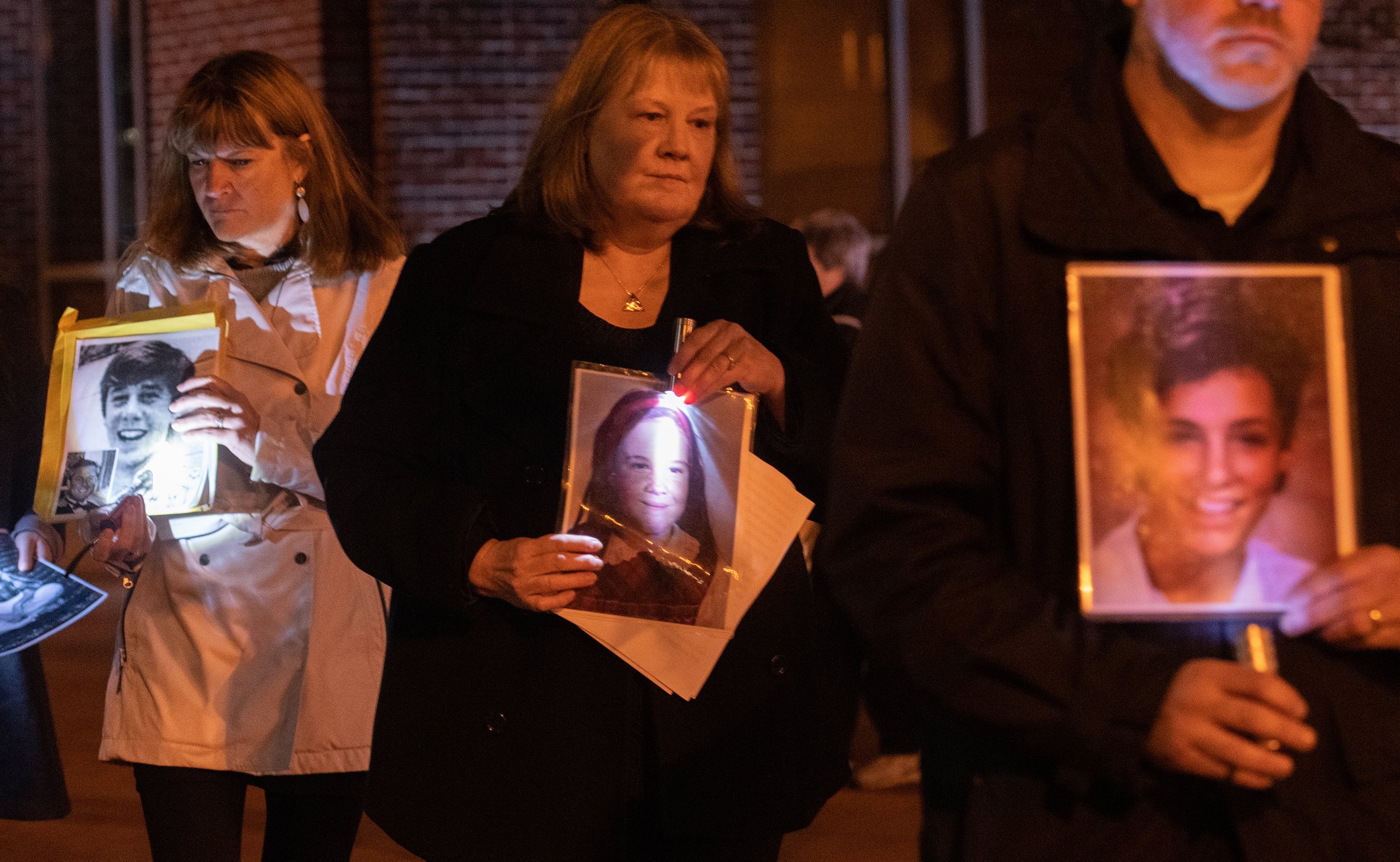 Supporters of SNAP, Survivors Network of those Abused by Priests, walk in memory of alleged abuse victims outside the 2018 assembly of the U.S. bishops in Baltimore. (CNS photo/Kevin J. Parks, Catholic Review)