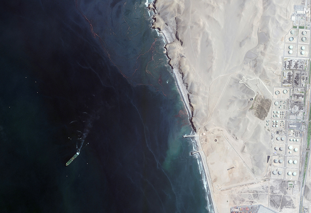 A satellite image shows the Repsol's La Pampilla refinery near Ventanilla, Peru, Jan. 19, after an oil spill. (CNS/Maxar Technologies, handout via Reuters) 