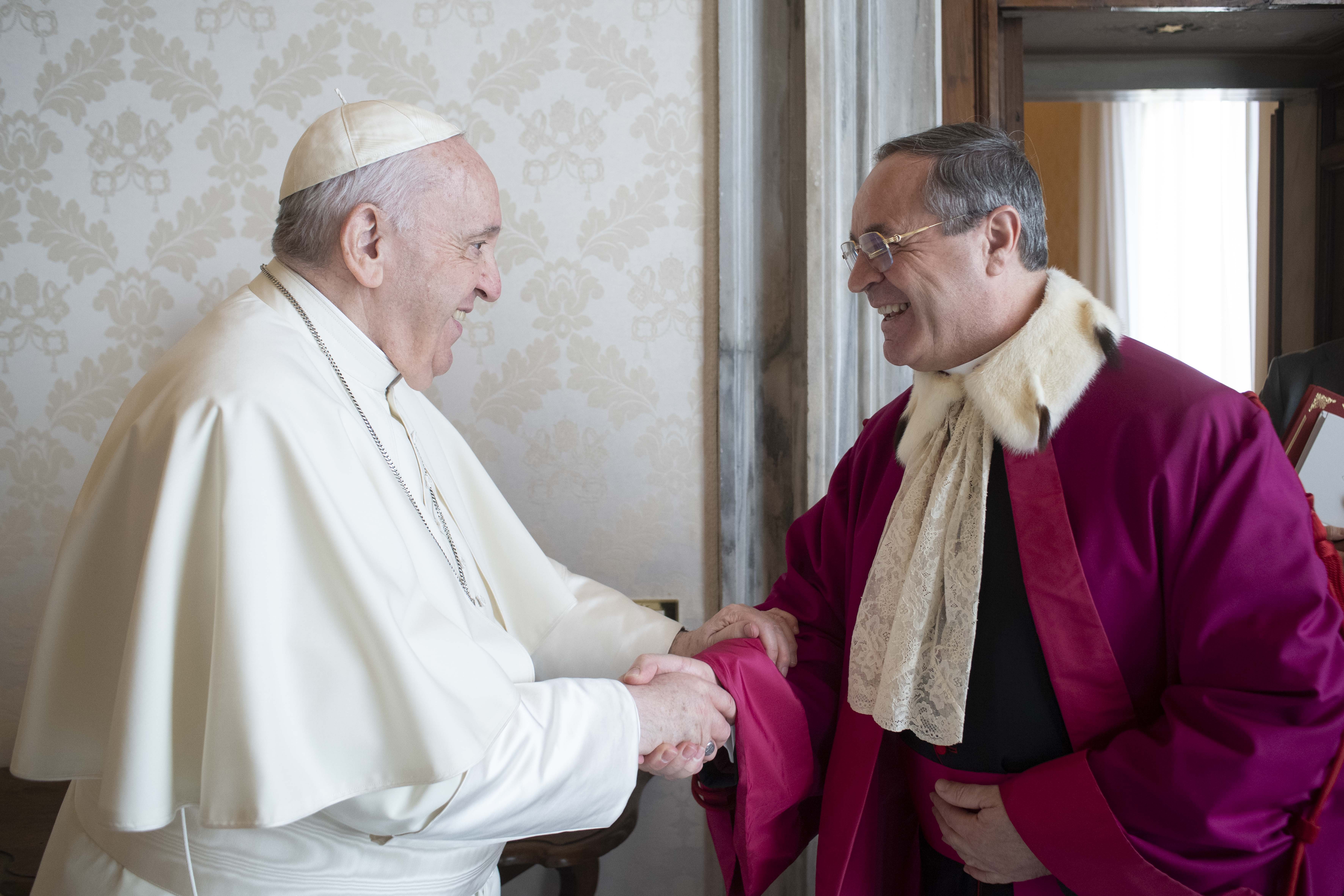Pope Francis greets Msgr. Alejandro Arellano Cedillo, dean of the Roman Rota, during an annual audience with members of the Tribunal of the Roman Rota at the Vatican Jan. 27, 2022.. (CNS photo/Vatican Media)