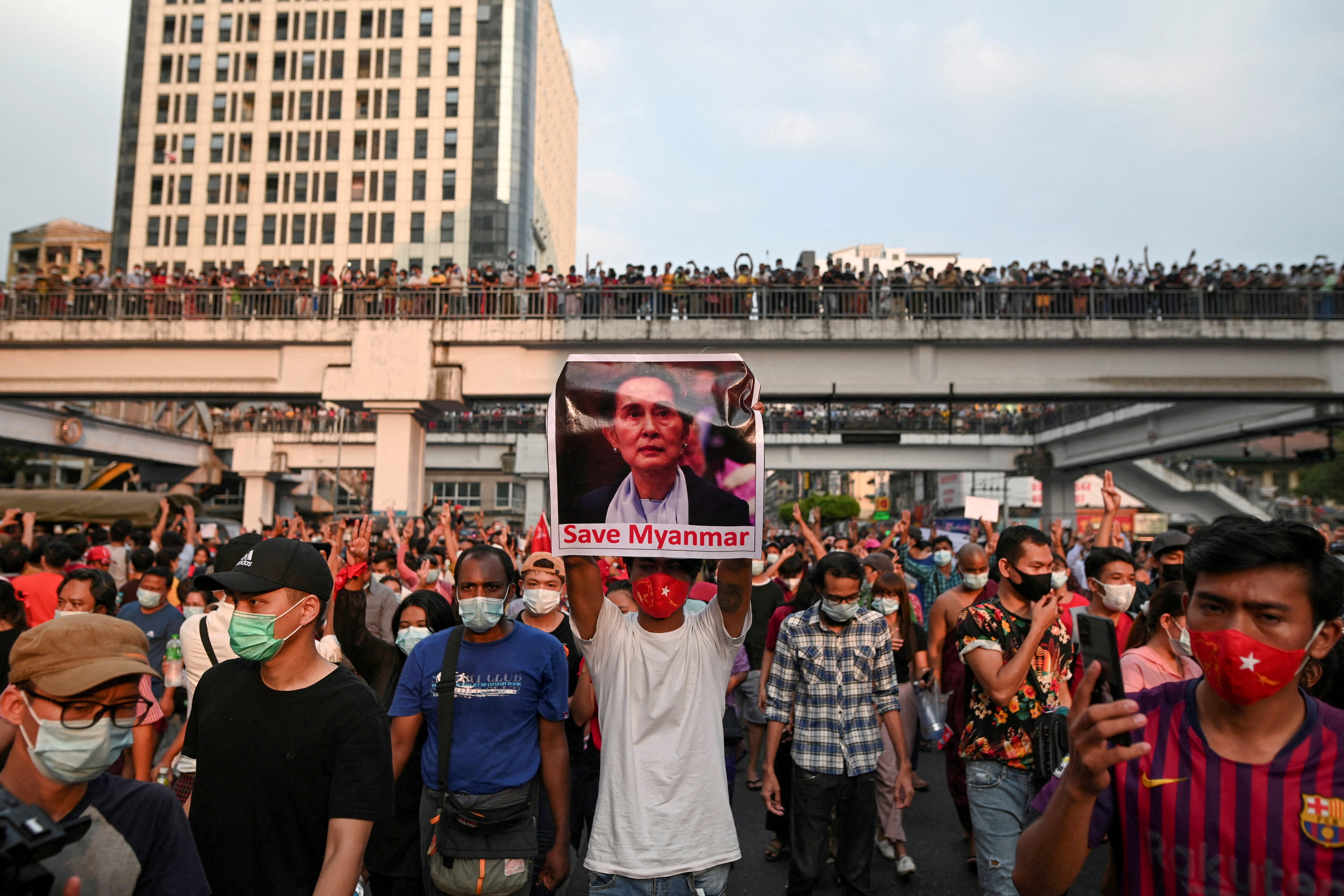 Demonstrators protest the military coup and demand the release of elected leader Aung San Suu Kyi in Yangon, Myanmar, Feb. 6, 2021. (CNS photo/Reuters)