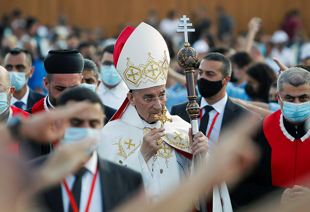 Cardinal Bechara Rai, Maronite patriarch, arrives to celebrate a Mass to mark the one-year anniversary of Beirut's port blast Aug. 4, 2021. The blast killed killed over 200 people, injured 7,000, left 300,000 homeless. (CNS/Reuters/Mohamed Azakir)