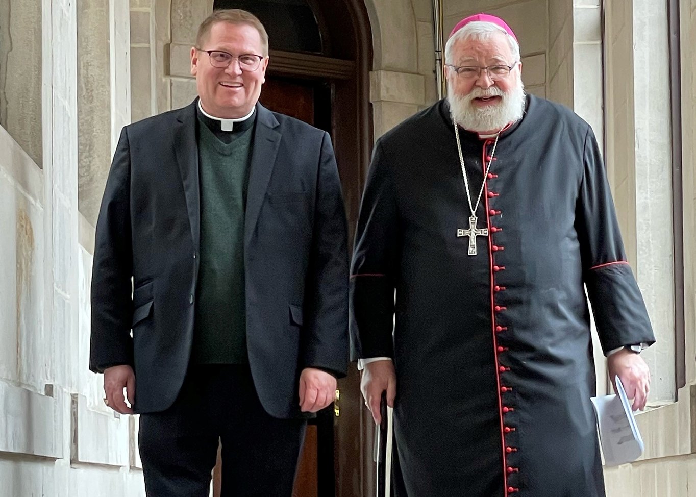 Coadjutor Bishop Louis Tylka, left, and Bishop Daniel R. Jenky are seen at St. Mary's Cathedral in Peoria, Ill., Feb. 23, 2022. Pope Francis accepted the resignation of Bishop Jenky March 3, 2022, and as coadjutor, Bishop Tylka immediately succeeds him as