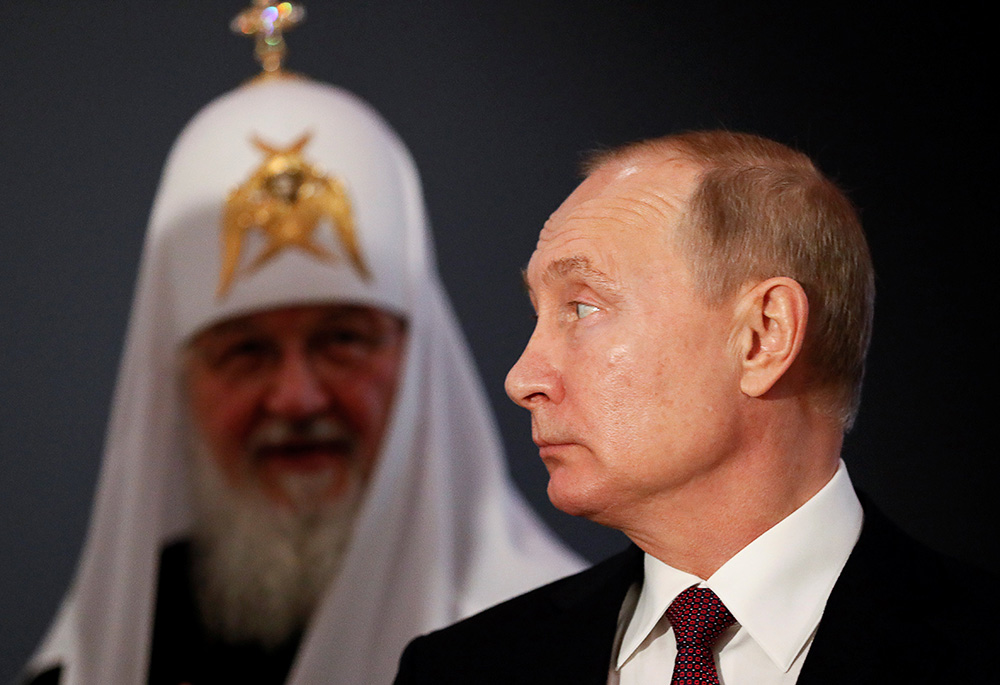Russian President Vladimir Putin and Russian Orthodox Patriarch Kirill of Moscow visit the exhibition, "Memory of Generations: the Great Patriotic War in Pictorial Arts," on the National Unity Day in Moscow in this Nov. 4, 2019, file photo. (CNS/Shamil Zh Russian President Vladimir Putin and Russian Orthodox Patriarch Kirill of Moscow visit the exhibition, "Memory of Generations: the Great Patriotic War in Pictorial Arts," on the National Unity Day in Moscow in this Nov. 4, 2019, file photo. (CNS/Shamil Zh