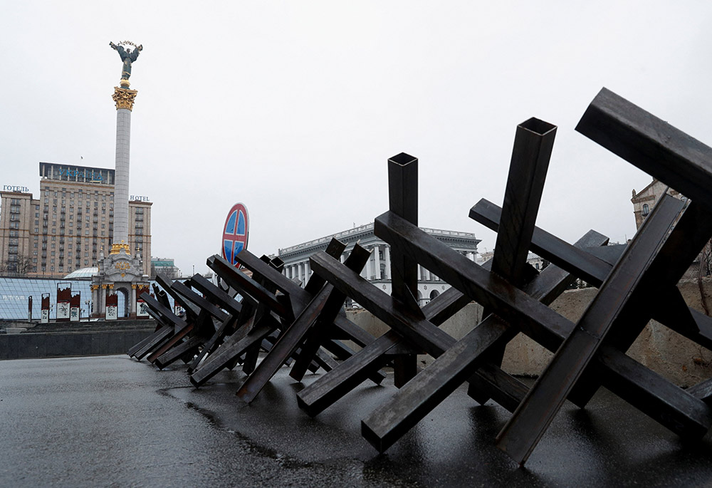 Anti-tank obstacles are seen at a checkpoint in Independence Square March 3, 2022, in central Kyiv, Ukraine, as Russia's invasion of Ukraine continues. (CNS/Reuters/Valentyn Ogirenko)
