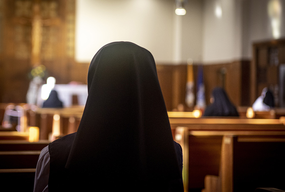 A woman religious attends Mass in the chapel of the motherhouse of the Oblate Sisters of Providence near Baltimore Feb. 9. (CNS/Chaz Muth)