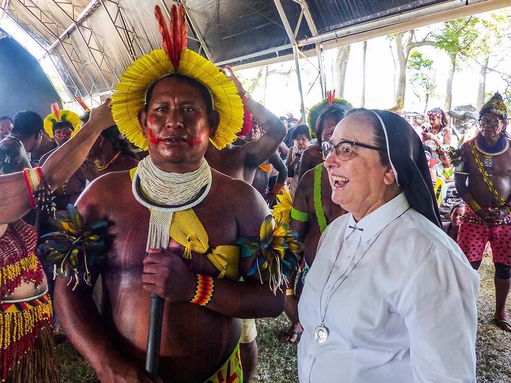 Messengers of Divine Love Sr. Maria Inês Ribeiro meets with Indigenous leaders at the Acampamento Terra Livre 2022-ATL (Free Land Camp) in Brasília April 7. (CNS/Courtesy of CRB Nacional)