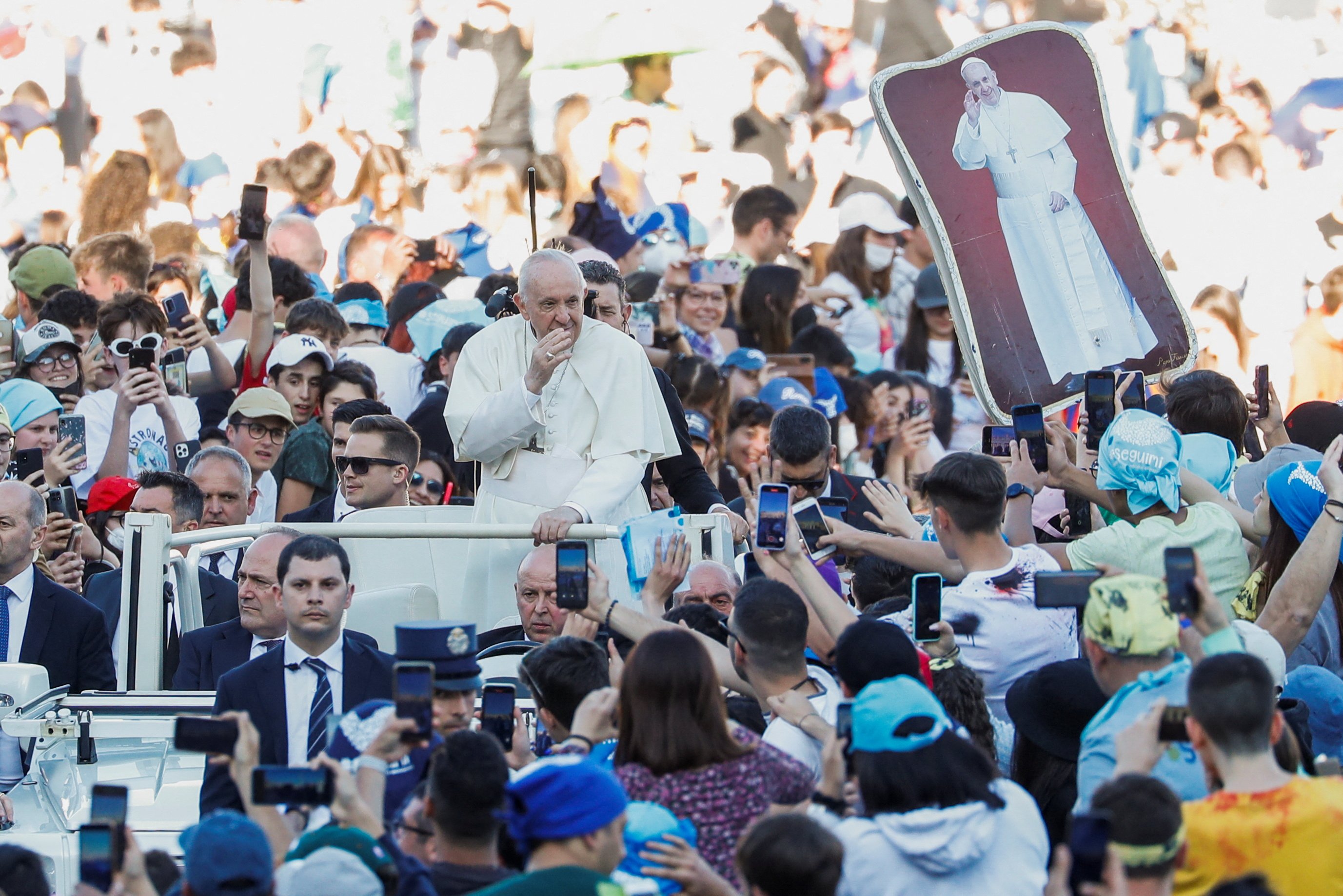 Pope Francis waves as he arrives for a meeting with thousands of young people taking part in a pilgrimage organized by the Italian bishops' conference in St. Peter's Square at the Vatican April 18, 2022. (CNS photo/Remo Casilli, Reuters)