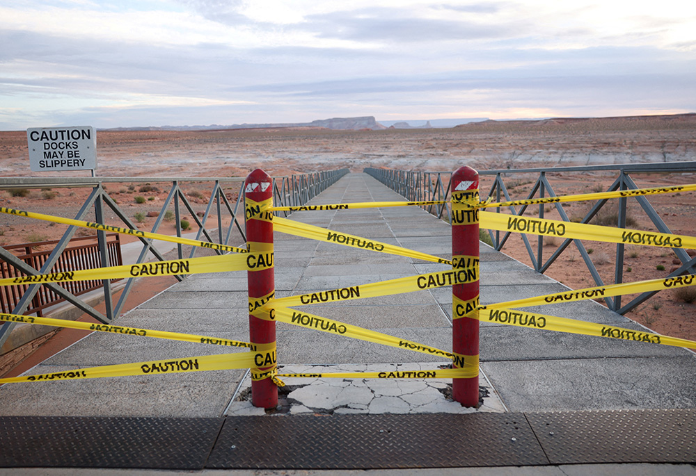 A closed boat ramp at Lake Powell in Page, Arizona, extends into desert sand April 19. (CNS/Reuters/Caitlin Ochs)