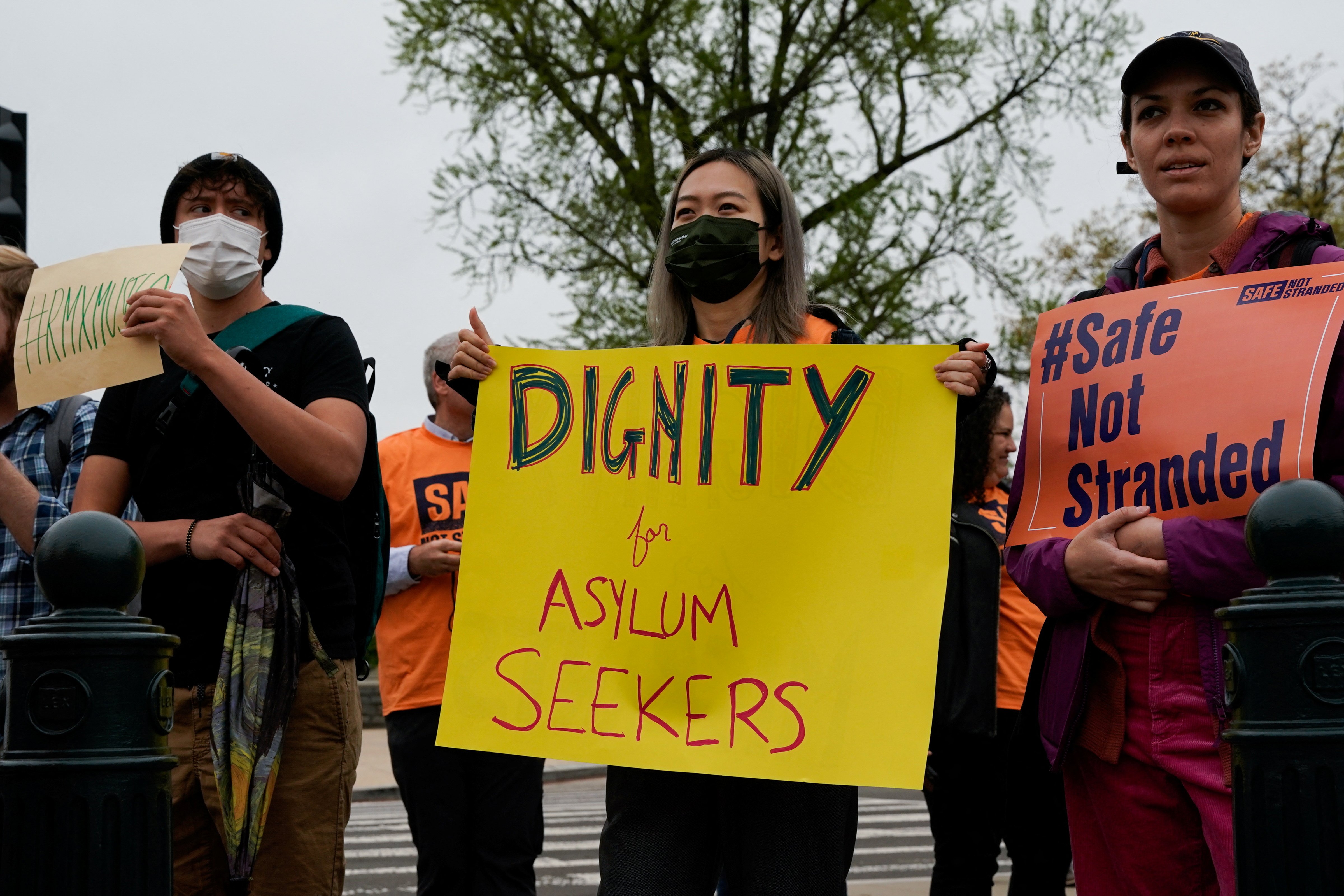 People in support of asylum seekers rally near the Supreme Court in Washington April 26, 2022. (CNS photo/Elizabeth Frantz, Reuters)