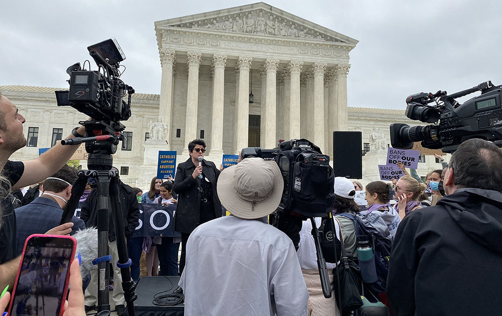 Jamie Manson of Catholics for Choice speaks to a crowd outside the Supreme Court of the United States May 3, the day after a draft opinion was leaked signaling that the majority of justices were leaning toward overturning Roe v. Wade. (CNS/Rhina Guidos)