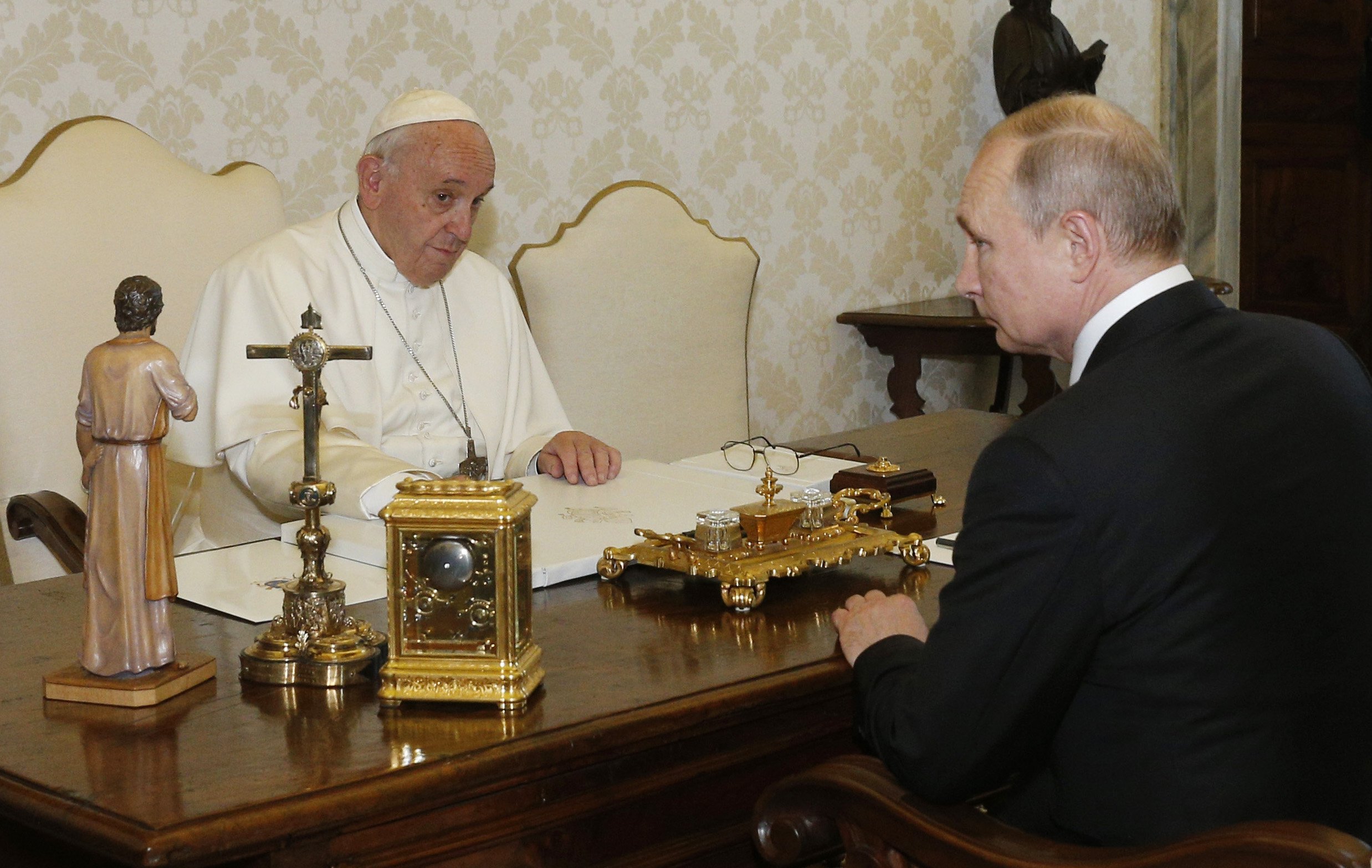 Pope Francis greets Russian President Vladimir Putin during a private audience at the Vatican in this July 4, 2019. (CNS photo/Paul Haring)