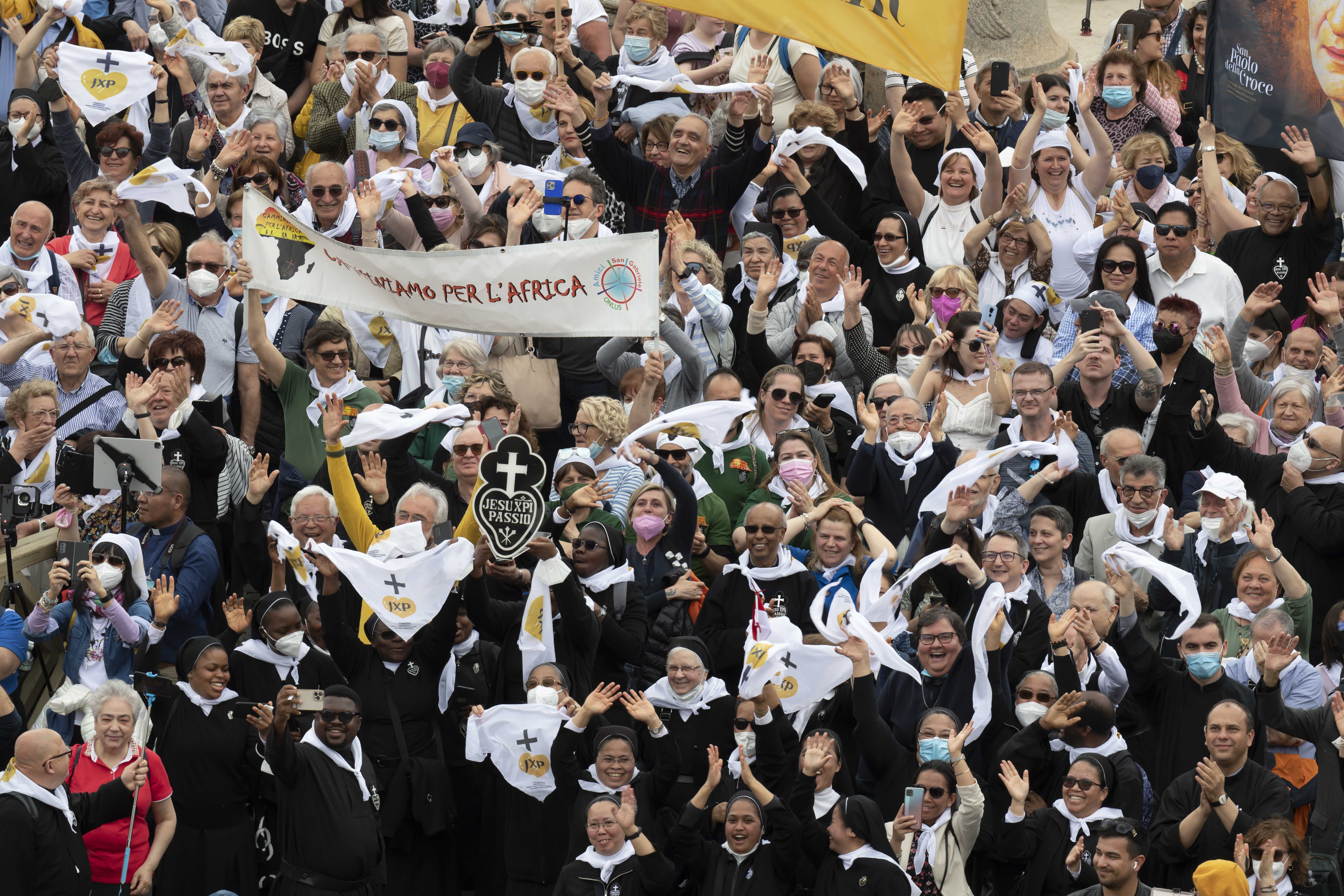 People in St. Peter's Square attend the "Regina Coeli" prayer led by Pope Francis from the window of his studio overlooking the square at the Vatican May 8, 2022. (CNS photo/Vatican Media)