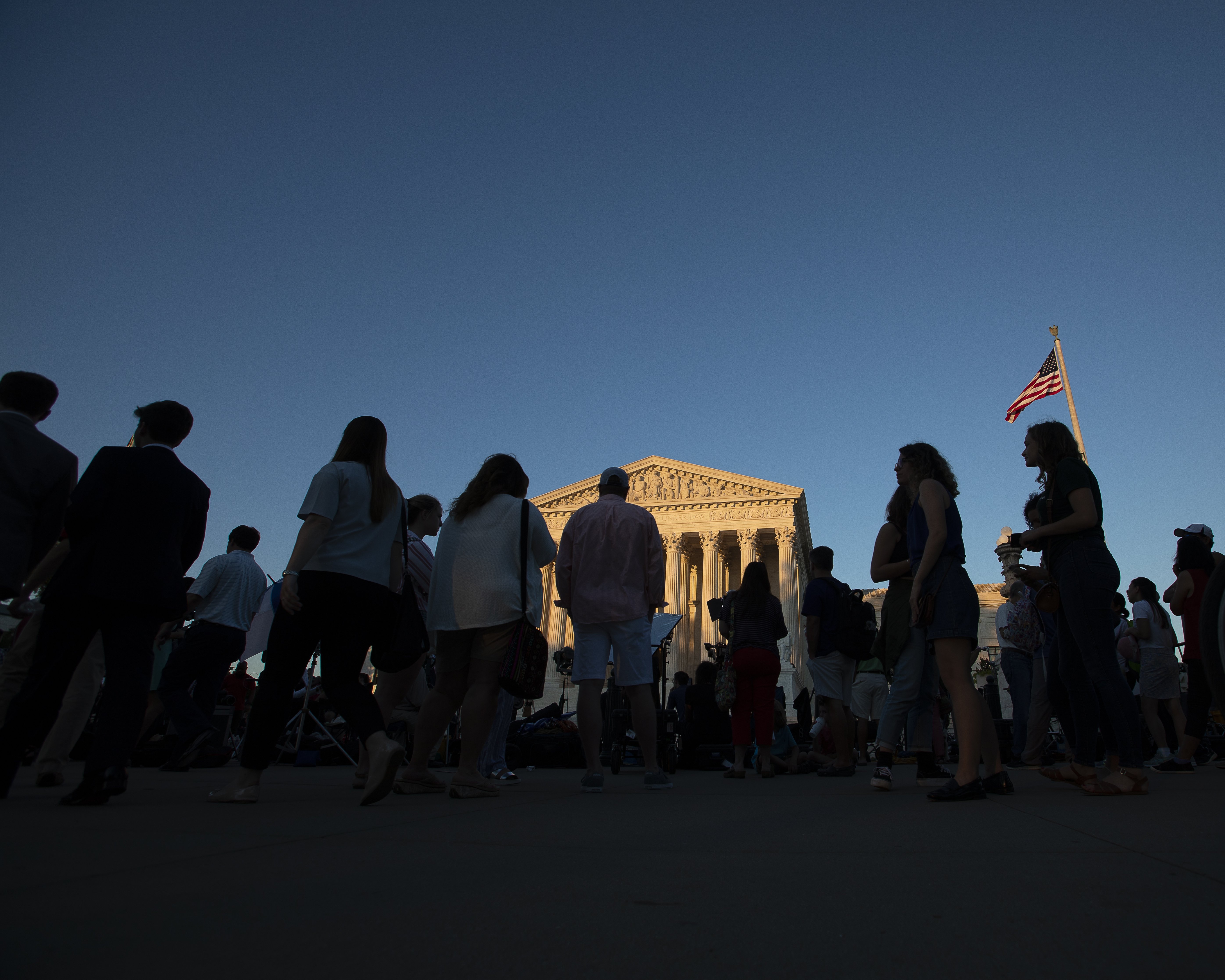 People are seen outside the U.S. Supreme Court July 9, 2018, in Washington. (CNS/Tyler Orsburn)