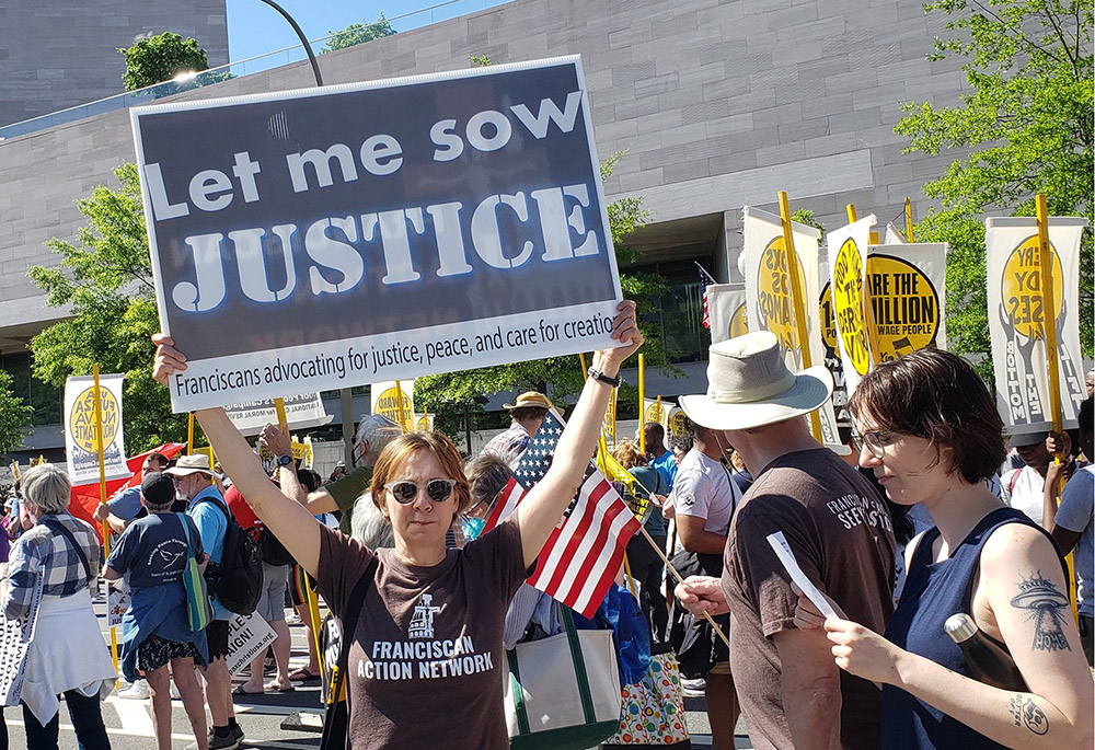 Members of Catholic groups take part in the Moral March on Washington June 18 sponsored by the Poor People's Campaign. (CNS/Courtesy of Franciscan Action Network)