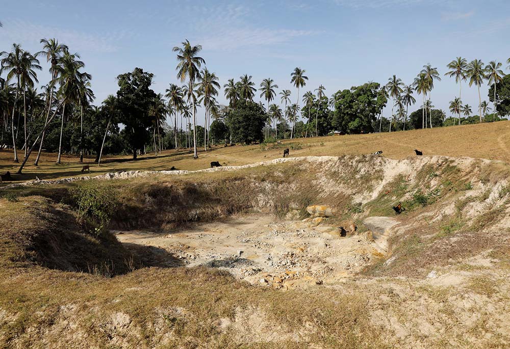 A dried-up water hole is seen in Kilifi, Kenya, on Feb. 16. (CNS/Reuters/Baz Ratner)