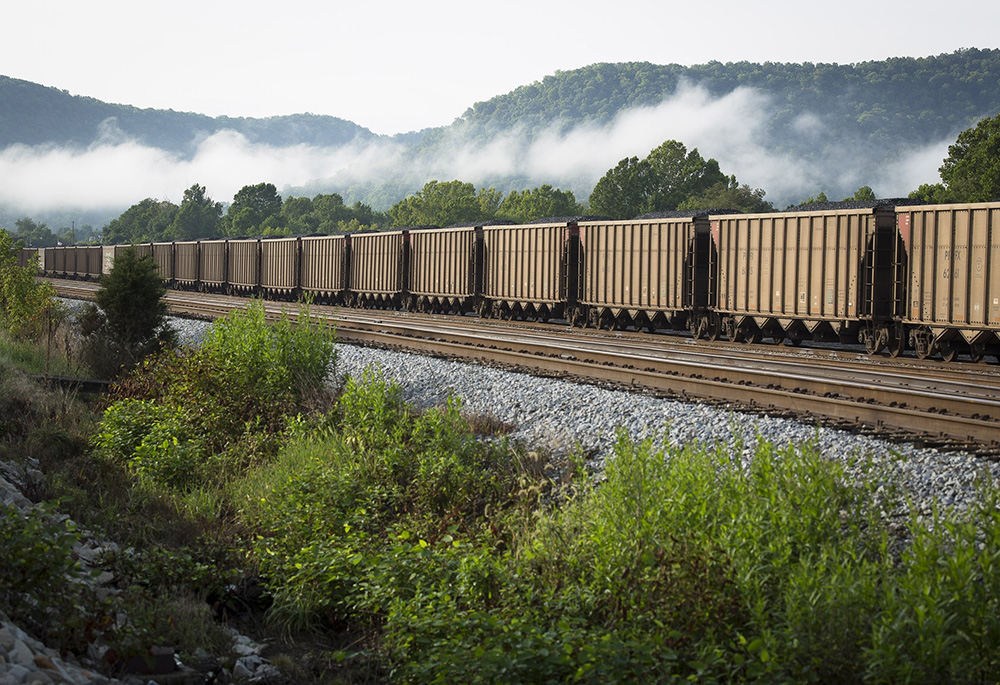 A train carries coal Aug. 21, 2014, near Ravenna, Kentucky. The Supreme Court ruled June 30 to limit the Environmental Protection Agency’s ability to regulate carbon emissions from power plants. (CNS/Tyler Orsburn) A train carries coal Aug. 21, 2014, near Ravenna, Kentucky. The Supreme Court ruled June 30 to limit the Environmental Protection Agency’s ability to regulate carbon emissions from power plants. (CNS/Tyler Orsburn)
