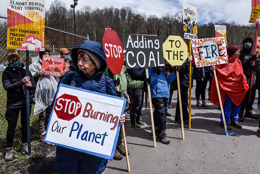 People in Grant Town, West Virginia, protest the Grant Town Coal Waste Power Plant April 9. (CNS/Reuters/Stephanie Keith)
