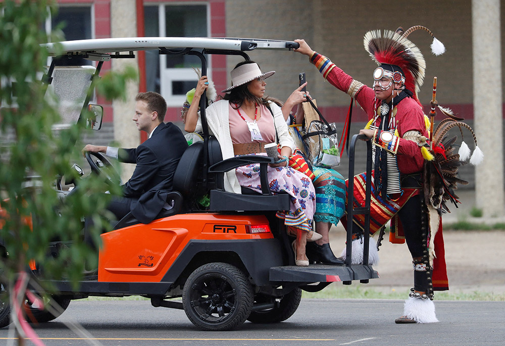 An Indigenous dancer arrives ahead of Pope Francis July 25 in Maskwacis, Alberta, Canada. (CNS/Reuters/Todd Korol) An Indigenous dancer arrives ahead of Pope Francis July 25 in Maskwacis, Alberta, Canada. (CNS/Reuters/Todd Korol)