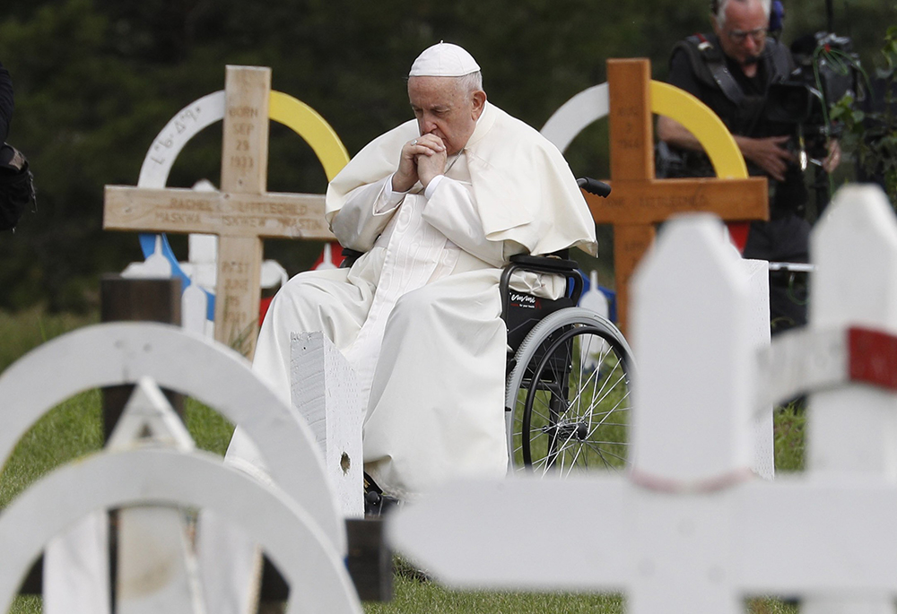 Pope Francis prays at the Ermineskin Cree Nation Cemetery before meeting with First Nations, Métis and Inuit communities July 25, 2022, at Maskwacis, Alberta. (CNS/Paul Haring)
