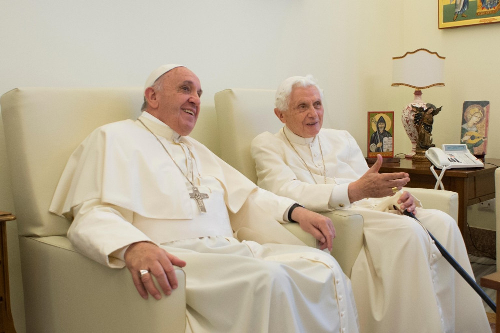 Pope Francis chats with retired Pope Benedict XVI at the retired pope's home in the Mater Ecclesiae monastery at the Vatican June 30, 2015. (CNS/L'Osservatore Romano)
