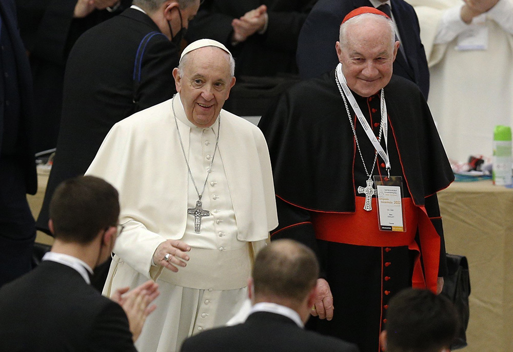 Pope Francis walks next to Cardinal Marc Ouellet as he arrives to open an international symposium on priesthood at the Vatican in this Feb. 17 file photo. (CNS/Paul Haring)