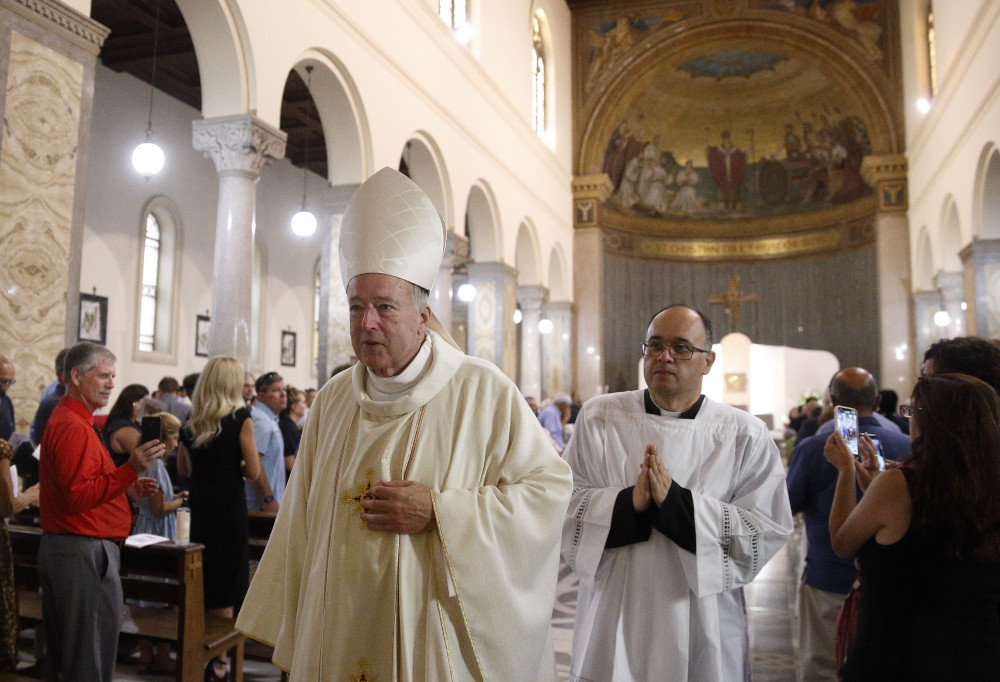 New Cardinal Robert W. McElroy of San Diego leaves after celebrating a Mass of thanksgiving at St. Patrick's Church, official home of the U.S. Catholic community in Rome, Aug. 28, 2022. (CNS photo/Paul Haring)